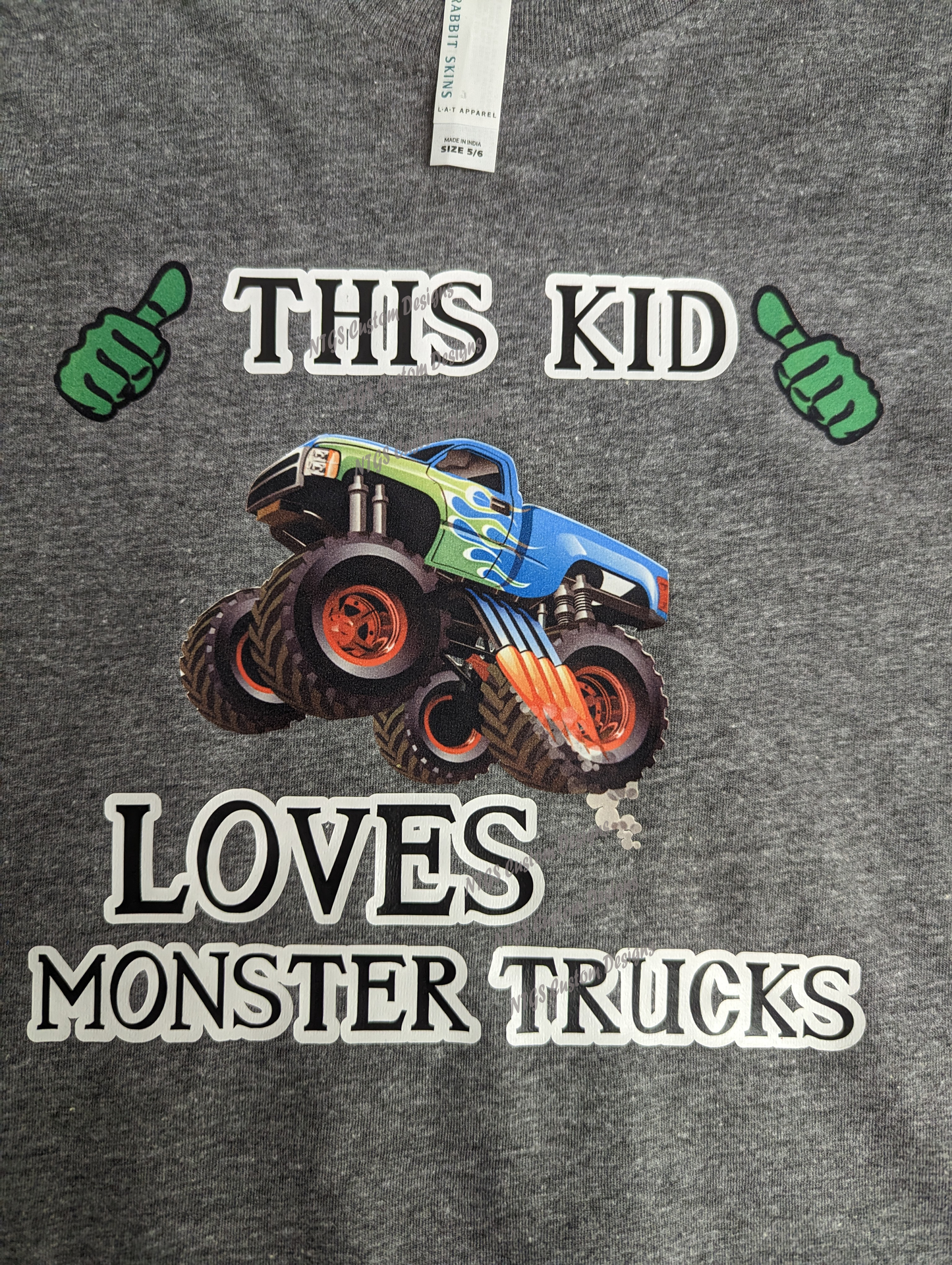 This Kid Loves Monster Trucks