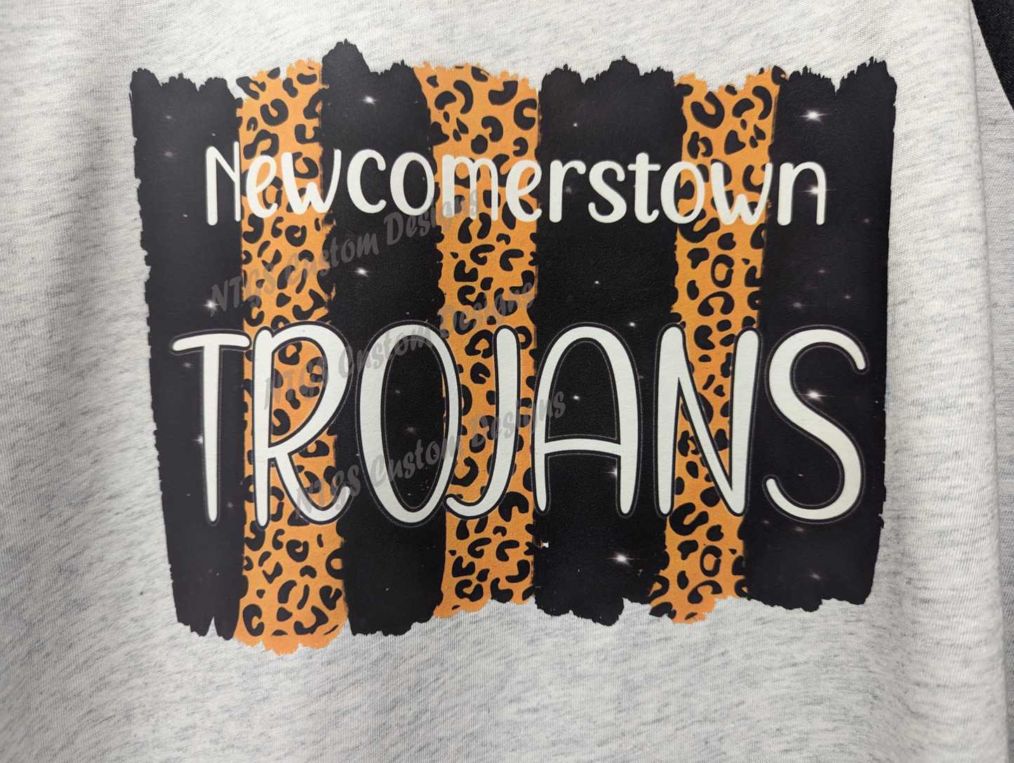 Newcomerstown Trojans orange and black cheetah 3/4 sleeves