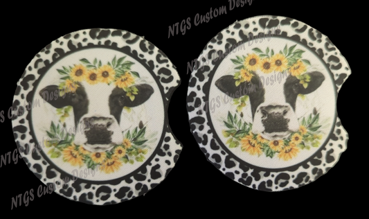 Cow with sunflowers and cheetah cup coasters